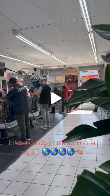Detail work on a haircut at Batista Barbershop